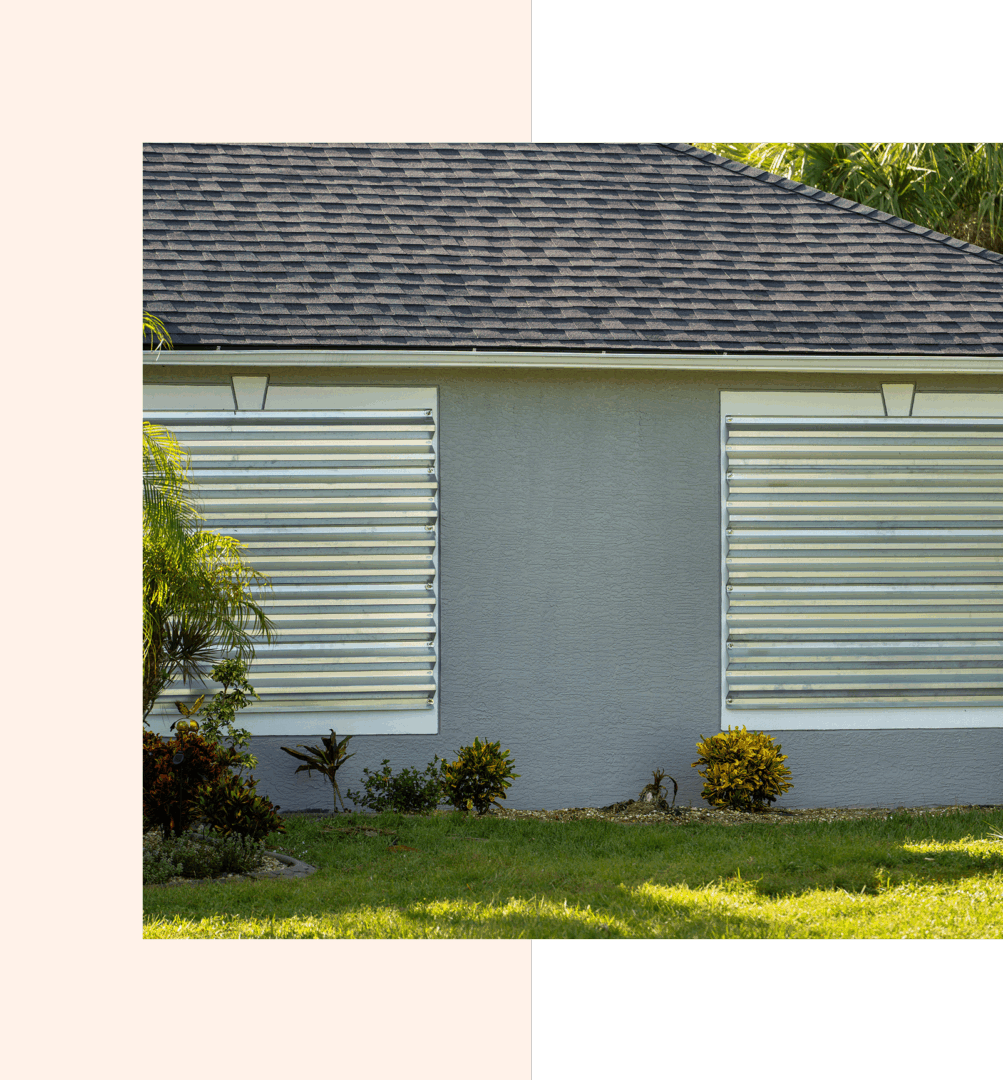 House with hurricane shutters and garden.