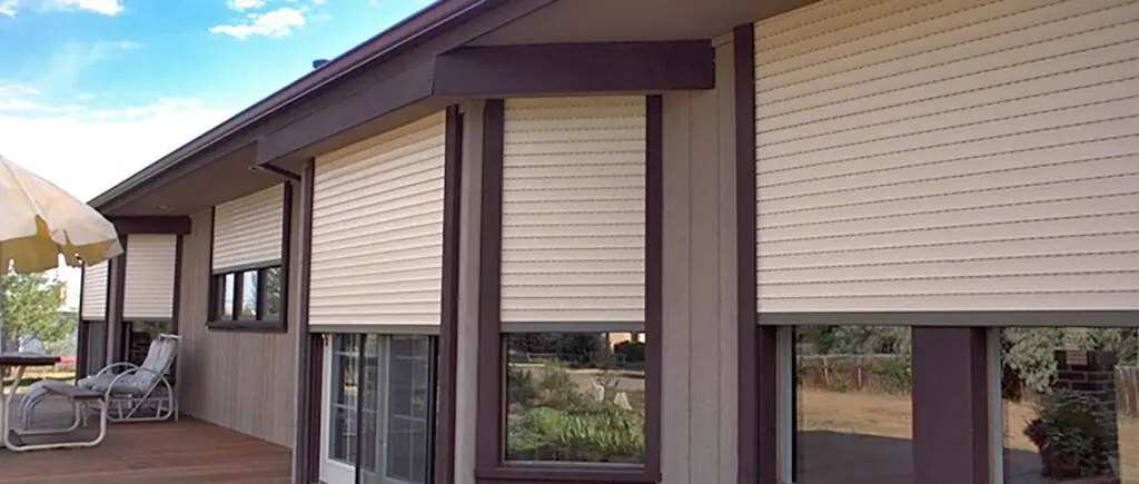 House with closed exterior roller shutters